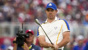 <p>Team Europe's Rory McIlroy watches his shot on the 15th hole during a Ryder Cup singles match. Picture: AP Photo/Charlie Neibergall</p>
