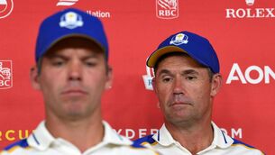 <p>GLOOM: Padraig Harrington and Paul Casey reflect on defeat in the Ryder Cup. </p>