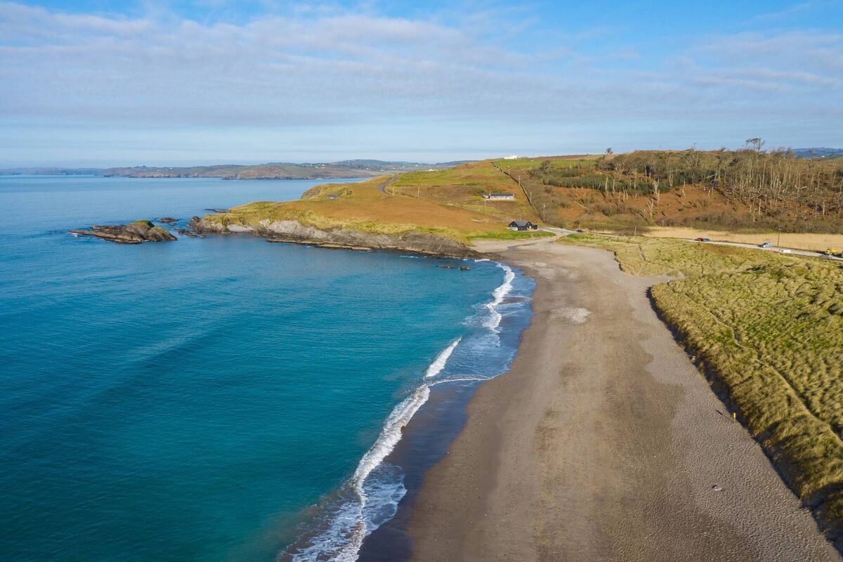 Long Strand beach with Castlefreke Woods in the background. Long Strand beach with Castlefreke Woods in the background.