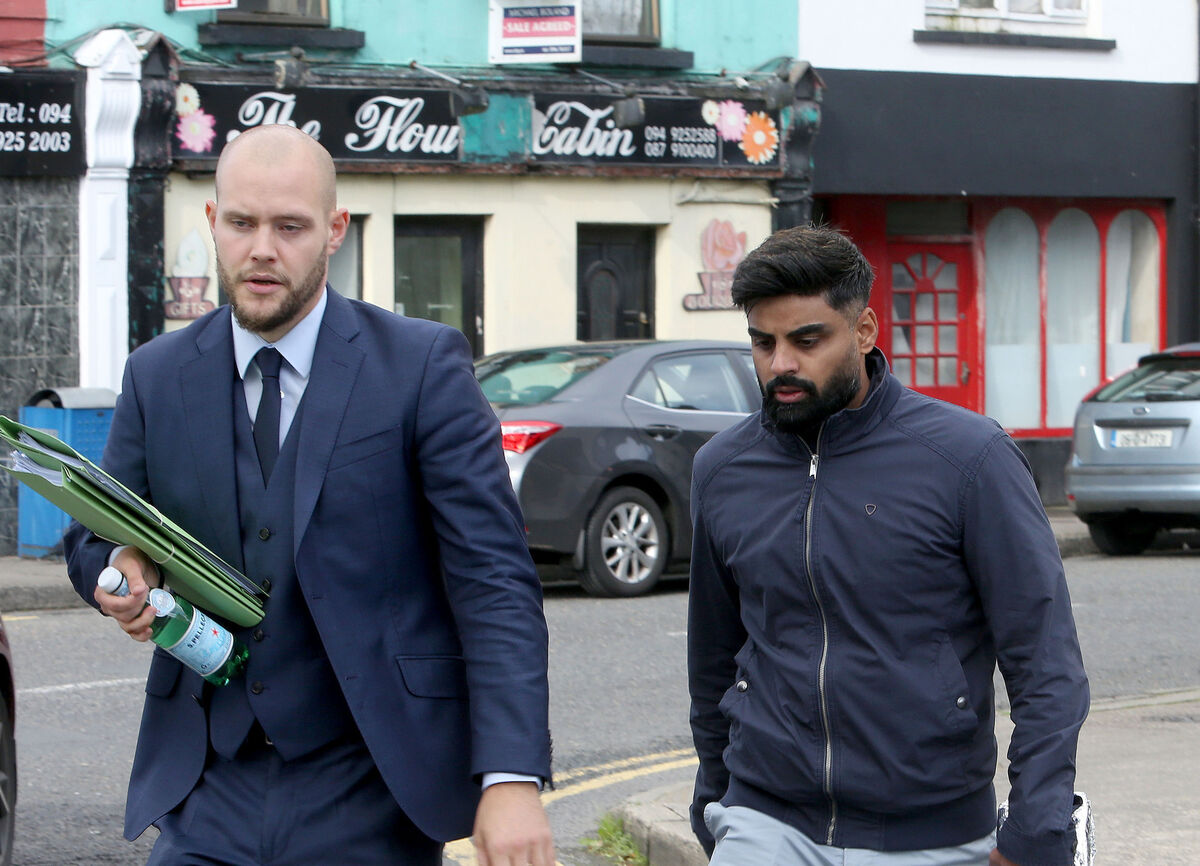 Ayaz Ul Hassan outside the coroners court with his solicitor Johan Verbruggen in Swinford, Co Mayo.