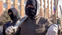 Dozens leave seized Ukraine offices