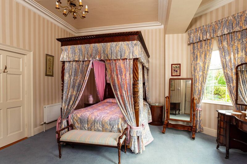 Four poster bed in one of the six bedrooms