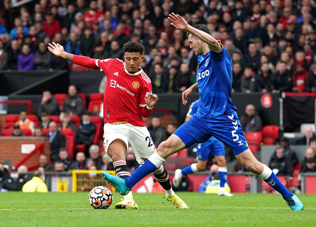 Manchester United's Jadon Sancho (left) and Everton's Michael Keane battle for the ball. Picture: Martin Rickett/PA