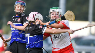 <p> Ballygarvan's Izzy O'Regan is strongly challenged by Sarsfields' Emma Casey, during their Senior Camogie Championship clash at Castle Road. Picture: David Keane.</p>