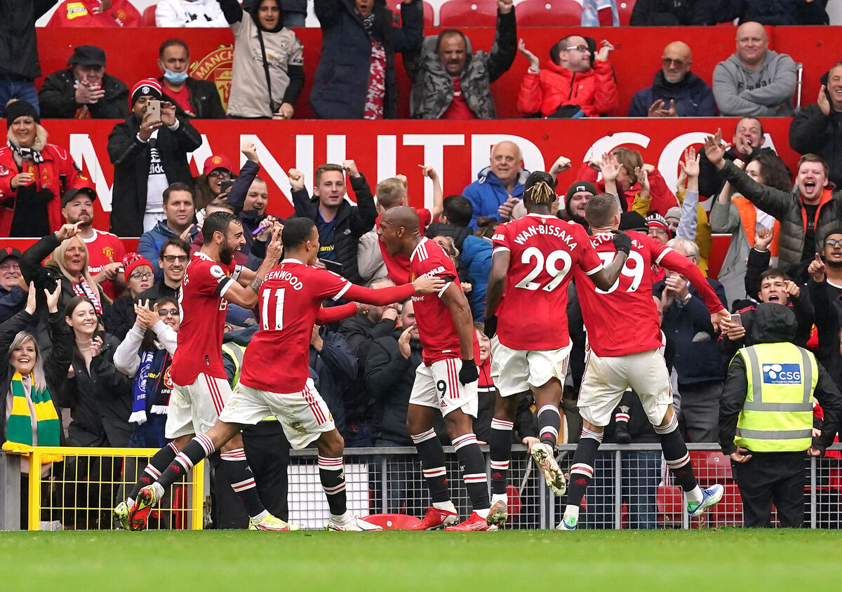 Manchester United's Anthony Martial (centre) celebrates scoring the opening goal. Picture: Martin Rickett/PA 