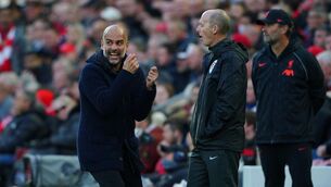 <p>Pep Guardiola was angered that Liverpool full-back James Milner escaped a second yellow card for a blatant trip on Bernardo Silva, with the game tied at 1-1 during a pulsating second half. Picture: Peter Byrne/PA</p>