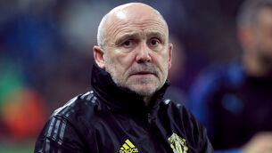 <p>Mike Phelan has extended his stay at Manchester United (Mike Egerton/PA)</p>