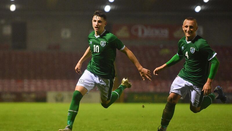 Rocco Vata of Republic of Ireland, right, celebrates with team-mate Sam Curtis after scoring his side's fifth goal.