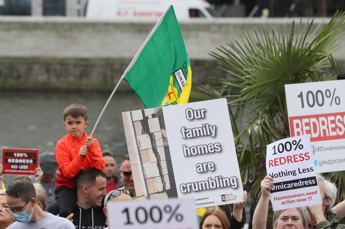 Signage at today's protest. Picture: Brian Lawless/PA Wire