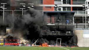 <p>Fire broke out at Estadi Nacional on Friday afternoon (Simon Peach/PA)</p>