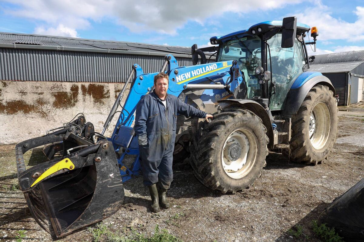 Dairy farmer Martin Davin, Eglish, Rathdowney, Co Laois, with his only tractor as he employs a local contractor. Dairy farmer Martin Davin, Eglish, Rathdowney, Co Laois, with his only tractor as he employs a local contractor.