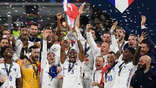 <p>French players celebrate with the trophy at the end of the Nations League final football match between Spain and France at San Siro stadium in Milan last night. <span class="contextmenu emphasis CaptionCredit">Picture: Franck Fife/AFP/Getty Images</span>
            </p>