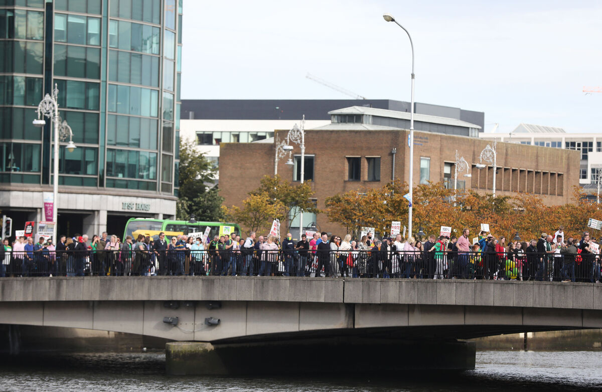 Protestors march across Talbot Memorial Bridge in Dublin on Friday. Picture: Leah Farrell / RollingNews.ie Protestors march across Talbot Memorial Bridge in Dublin on Friday. Picture: Leah Farrell / RollingNews.ie