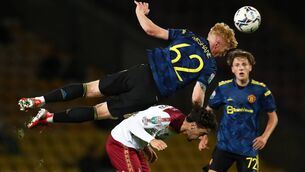 <p>BRADFORD, ENGLAND - SEPTEMBER 21: Paul McShane of Manchester United U21 wins a header above Alex Gilliead of Bradford City during the Papa John's Trophy match between Bradford City and Manchester United U21 at Utilita Energy Stadium on September 21, 2021 in Bradford, England. (Photo by George Wood/Getty Images)</p>