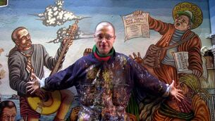 <p>Anthony Ruby beside a section of his mural, The Pana Shuffle, on  Mutton Lane in Cork in December 2004. Picture: Denis Scannell</p>