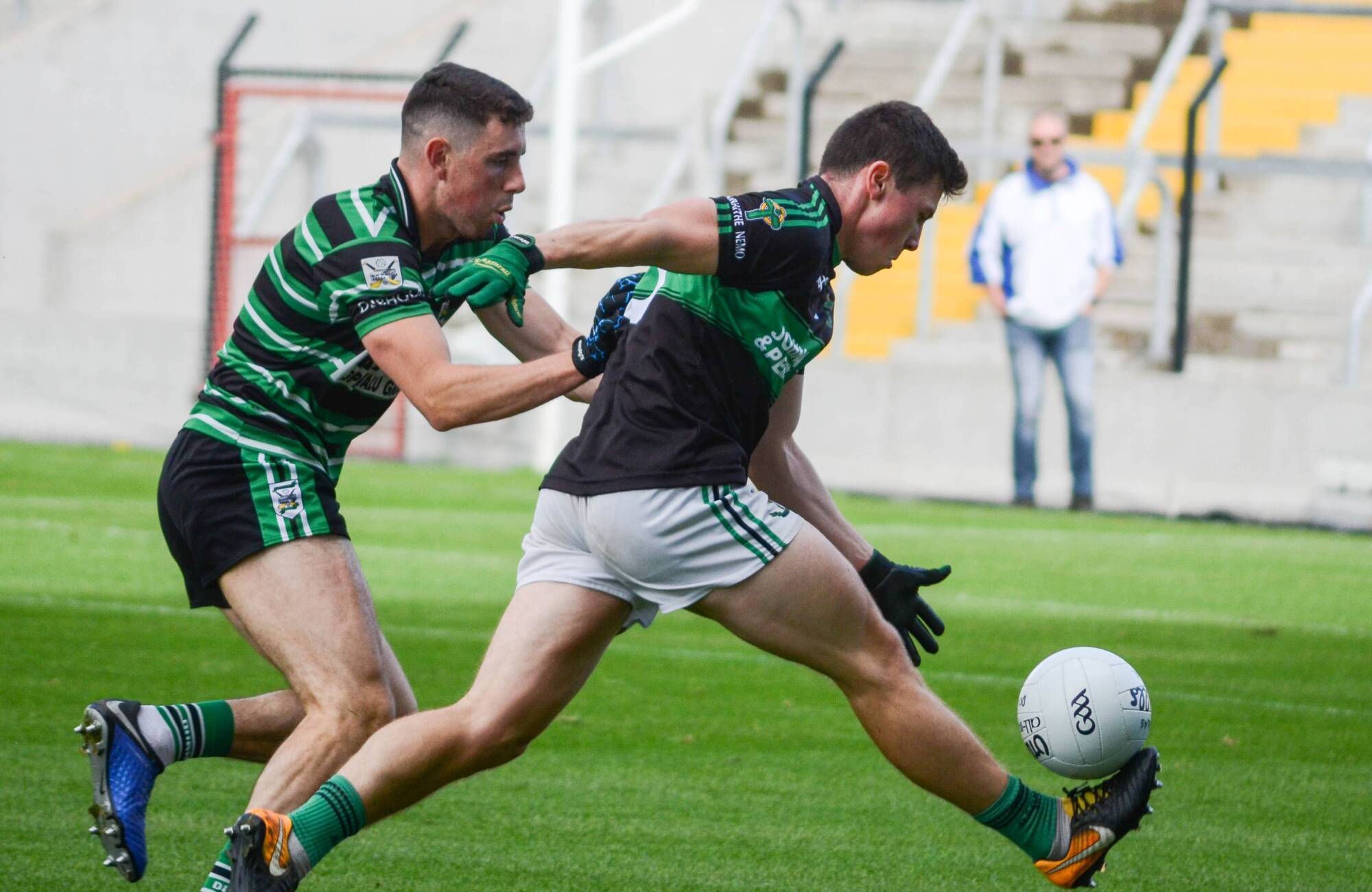 Nemo Rangers' Mark Cronin attempts to pull away from Sean Wilson of Douglas during the 2020 championship. Picture: Howard Crowdy