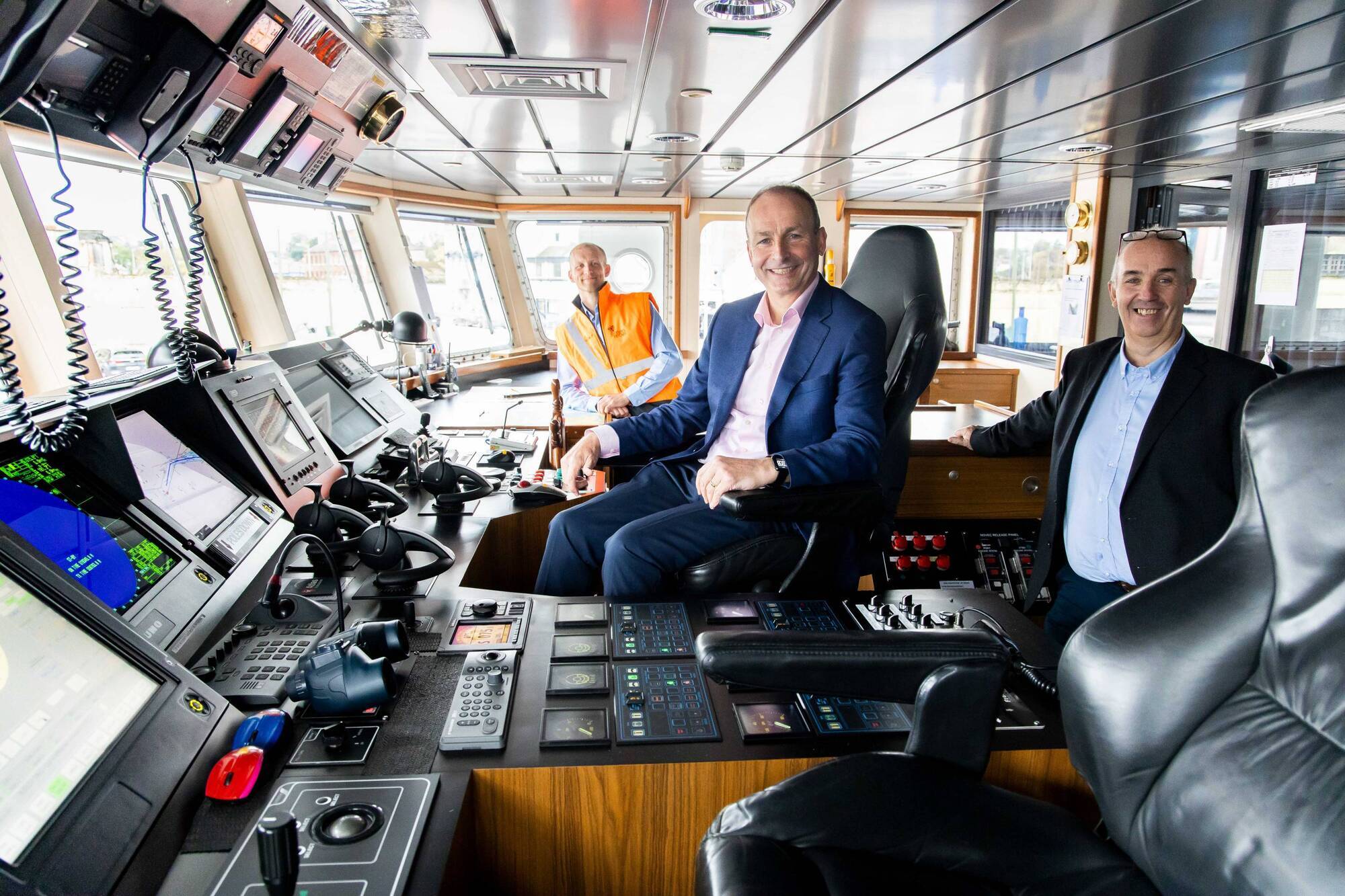 Taoiseach Micheal Martin joins John Wallace, Green Rebel CEO and Chris Franks (Left), Senior Master of the Roman Rebel on board the Roman Rebel for the announcement that Green Rebel is to create 50 jobs over the next year. Picture: Michael O'Sullivan /OSM PHOTO 