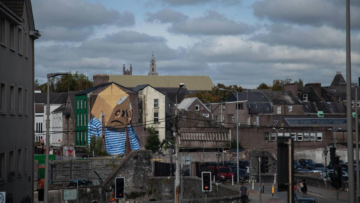 A new mural by Dublin artist Asbestos, created for Ardú 2021, South Main Street, Cork. The giant gable end mural challenges the passerby to think about ‘What is Home?’ Pic: Asbestos