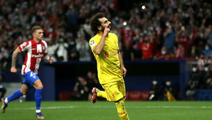 <p>Liverpool's Mo Salah celebrates scoring their side's third goal. Picture: Isabel Infantes/PA</p>