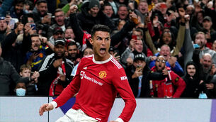 <p>Cristiano Ronaldo celebrates his winner against Atalanta (Martin Rickett/PA)</p>