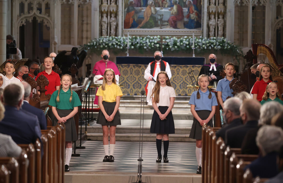 Children from local schools sing during the service. Picture: PA Wire