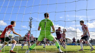 <p>Killian Phillips of Drogheda United heads his side's first goal during the SSE Airtricity League Premier Division match between Drogheda United and Derry City at United Park in Drogheda, Louth. Photo by Ramsey Cardy/Sportsfile</p>