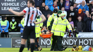 <p>St Mirren's Jamie McGrath is carried off the pitch on a stretcher during the Scottish Premiership match against Rangers at St Mirren Park, Paisley. Picture: Steve Welsh/PA</p>