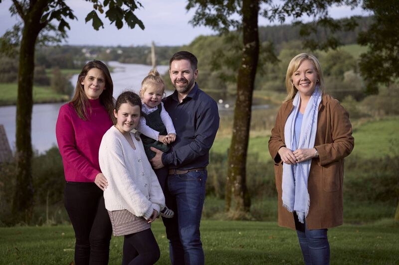 Anna and Chris Rudden and their two children Emily and Amelia with Arlene McIntyre.