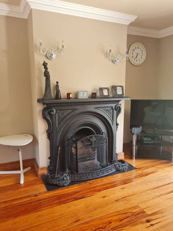 The fireplace in the living room before the makeover. 