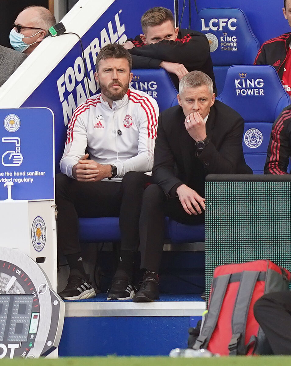 Manchester United manager Ole Gunnar Solskjaer looks dejected alongside coach Michael Carrick 