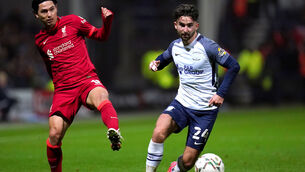 <p>Liverpool's Takumi Minamino (left) and Preston North End's Sean Maguire battle for the ball during the Carabao Cup Fourth Round match at Deepdale, Preston. Picture: Nick Potts/PA</p>