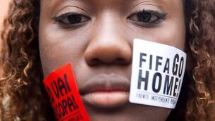 11 people held in World Cup city