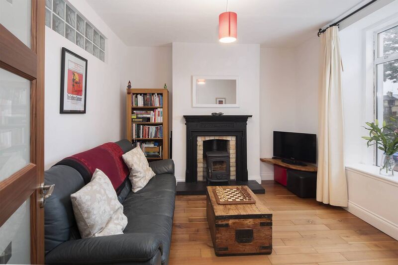 Note glass blocks in dividing wall between reception rooms