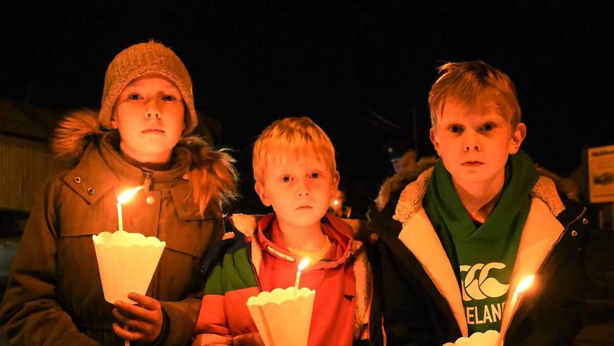 Grace, Ian and Darragh Fitzgerald at Skibbereen Arts Festival's memorial event, A Candle in the Wind, to commemorate all those who passed away locally during the pandemic and were unable to receive a proper traditional funeral. Picture: Denis Minihane.