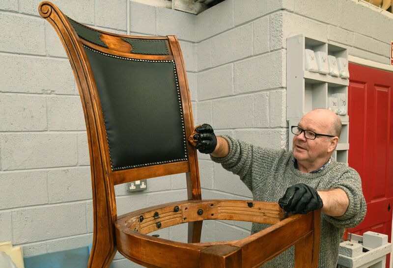 Michael Callanan French polishing a chair at Deaf Enterprises, Cork.