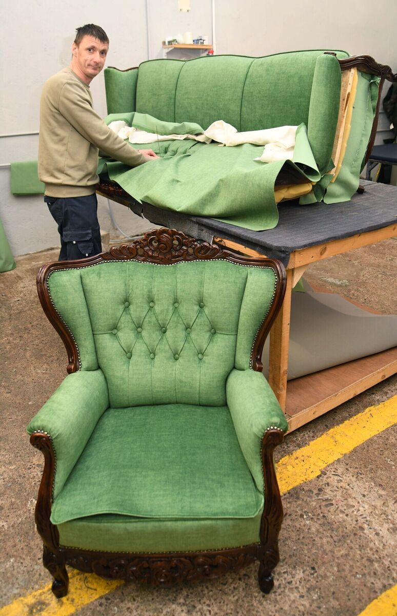 Michael White upholstering a sofa with an already upholstered chair from the three-piece suite. Michael White upholstering a sofa with an already upholstered chair from the three-piece suite.