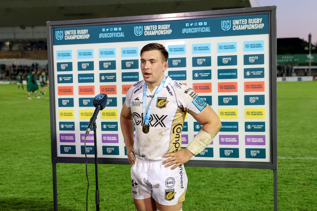 Dragons' Taine Basham is presented with the URC Player of the Match Medal for his performance against Connacht. Picture: INPHO/Bryan Keane