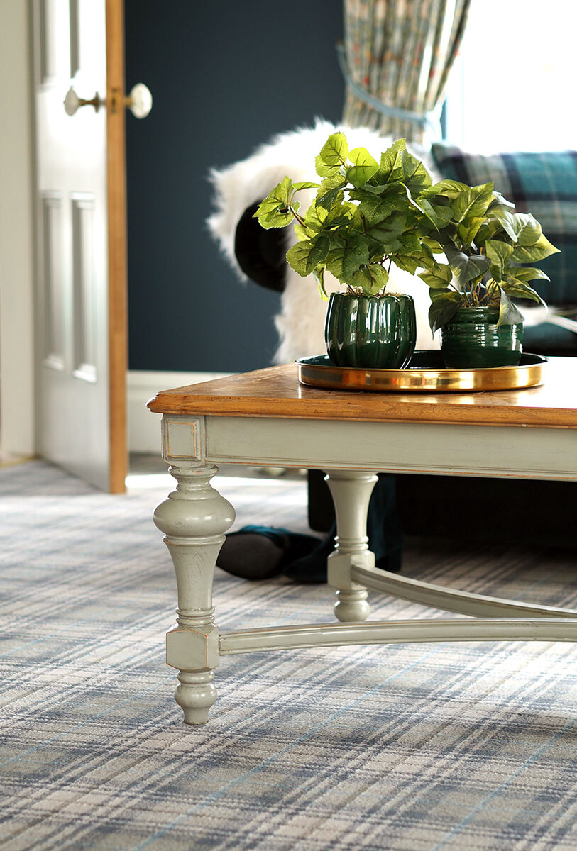 Stick to an 80:20 wool/synthetic mix in a tufted carpet with a good rich pile and a brand name you've actually heard of. Ulster Beaumont Inkstone, ulstercarpets.com.