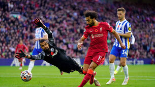 <p>Liverpool's Mohamed Salah rounds Brighton and Hove Albion goalkeeper Robert Sanchez to score before the goal is ruled out during the Premier League match at Anfield, Liverpool. Picture: Nick Potts/PA Wire </p>