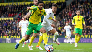 <p>Norwich City's Andrew Omobamidele and Leeds United's Rodrigo battle for the ball during the Premier League match at Carrow Road, Norwich. Picture: Joe Giddens/PA</p>