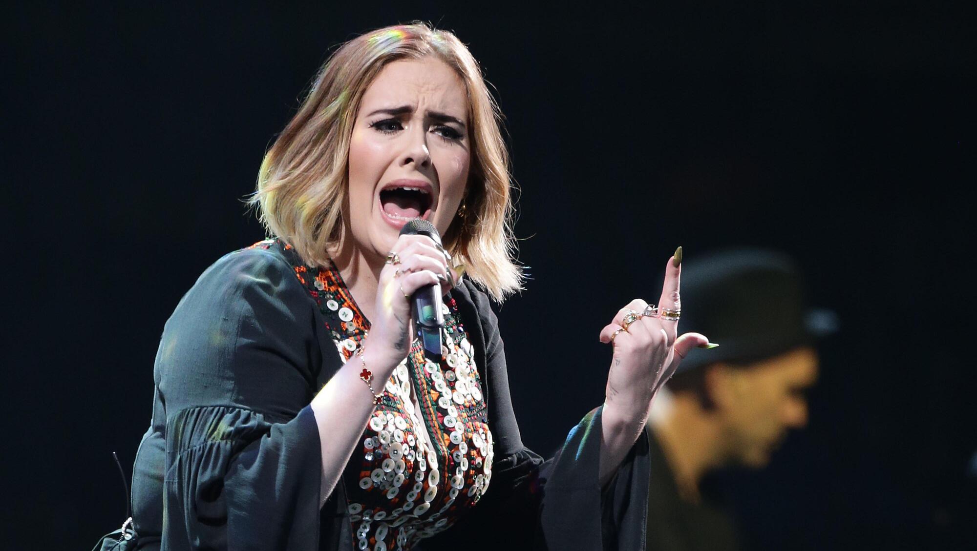 Adele shares tracklist for new album – including song titled I Drink Wine