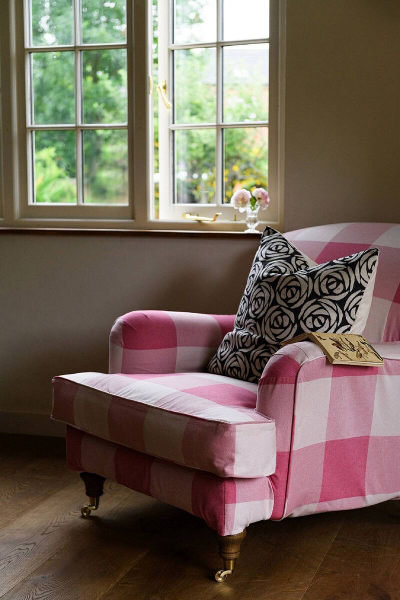 Armchair covered in Rose Collection (cushion) and Woodhouse Check Cotton Fabric Radish (armchair), Tori Murphy. Picture: Tori Murphy/PA