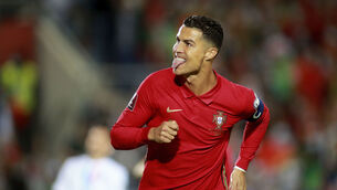 <p>Portugal's Cristiano Ronaldo celebrates after scoring his side's second goal during the World Cup 2022 group A qualifying soccer match between Portugal and Luxembourg at the Algarve stadium outside Faro, Portugal, Tuesday, Oct. 12, 2021. (AP Photo/Joao Matos)</p>
