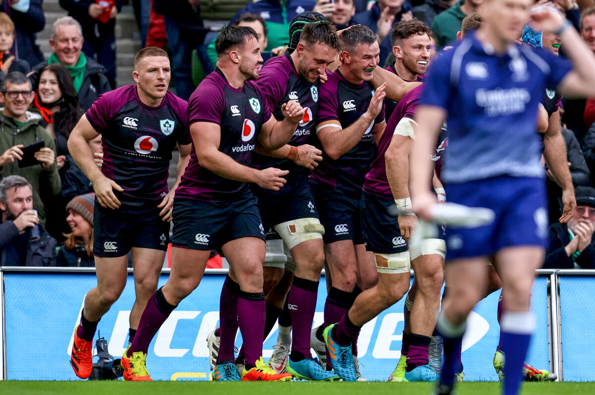 Ireland's Johnny Sexton celebrates after scoring a try on his 100th cap for Ireland with Ronan Kelleher, Jack Conan and Hugo Keenan. Picture: INPHO/Gary Carr