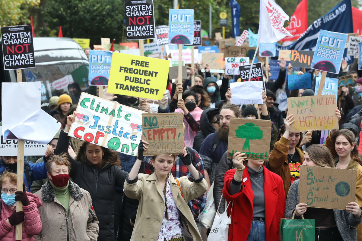 Protesters taking part in a Climate Action march in Dublin, to coincide with the COP26 Conference, arrive outside Leinster House on Merrion Square, where a meeting took place. Photograph: Leah Farrell / RollingNews.ie Protesters taking part in a Climate Action march in Dublin, to coincide with the COP26 Conference, arrive outside Leinster House on Merrion Square, where a meeting took place. Photograph: Leah Farrell / RollingNews.ie