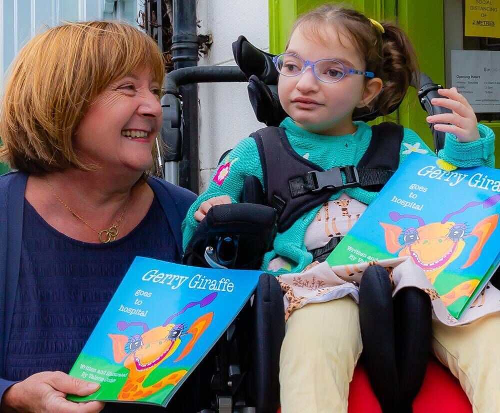 Valerie Judge, author, and Ava Kenny read Gerry The Giraffe Goes To Hospital. Picture: Sara Hanley Valerie Judge, author, and Ava Kenny read Gerry The Giraffe Goes To Hospital. Picture: Sara Hanley
