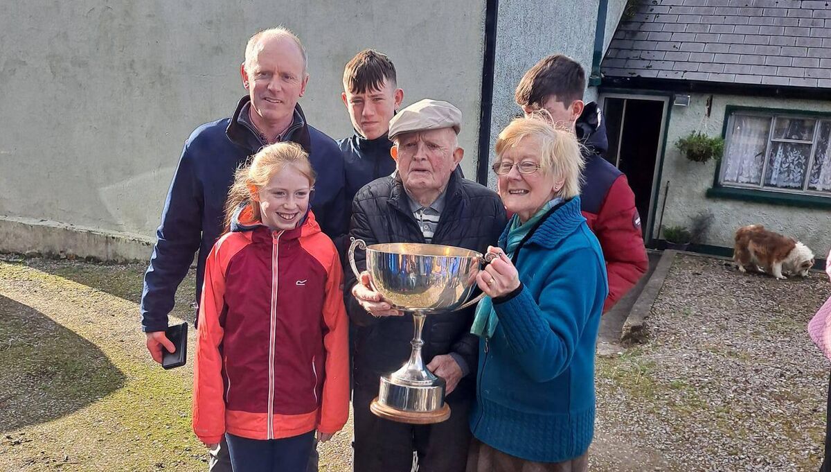 Aghinagh GAA president Dan O'Connor and his family celebrate with the Mid Cork JAFC title, finally annexed by Aghinagh after 73 years of trying