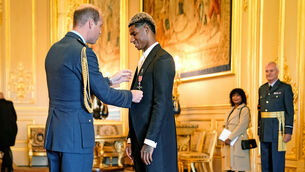 Footballer Marcus Rashford is made an MBE (Member of the Order of the British Empire) by the Duke of Cambridge during an investiture ceremony at Windsor Castle (Aaron Chown/PA)