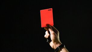 <p>30 April 2021; Referee Oliver Moran shows the red card during the SSE Airtricity League First Division match between Shelbourne and Treaty United at Tolka Park in Dublin. Photo by Piaras Ó Mídheach/Sportsfile</p>