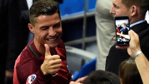 <p>Portugal forward Cristiano Ronaldo gives a thumbs up after the Euro 2016 final between Portugal and France at the Stade de France. Photo: Miguel Medina/AFP via Getty Images</p>